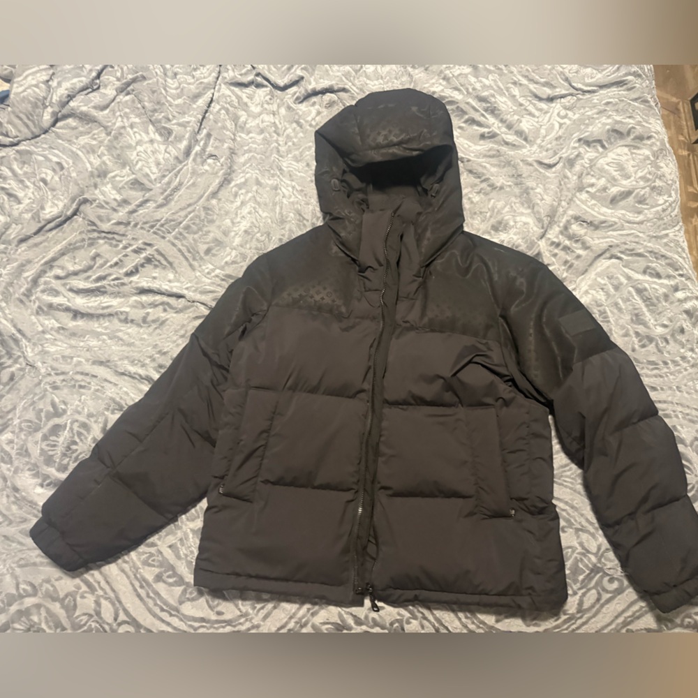 Men’s Black Louis Vuitton Puffer Coat.